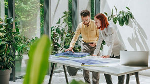 man-woman-working-with-solar-panels