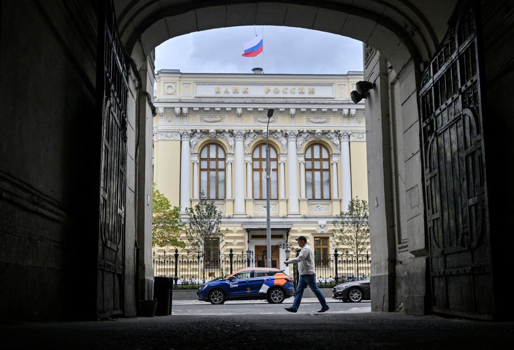  A man walks past the Russian Central Bank headquarters in downtown Moscow, Russia, on Sep. 6, 2023.