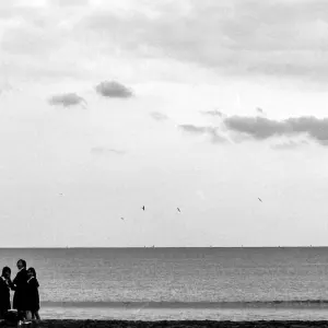 Schoolgirls gathering on Yuigahama beach