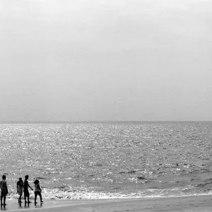 Silhouettes on beach