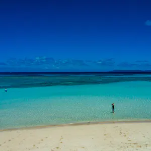 Figure in blue ocean