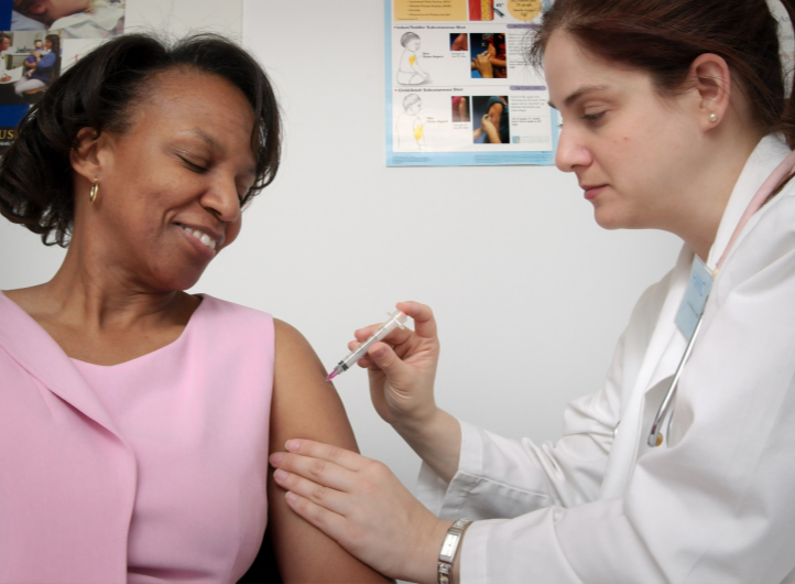 Woman getting flu shot