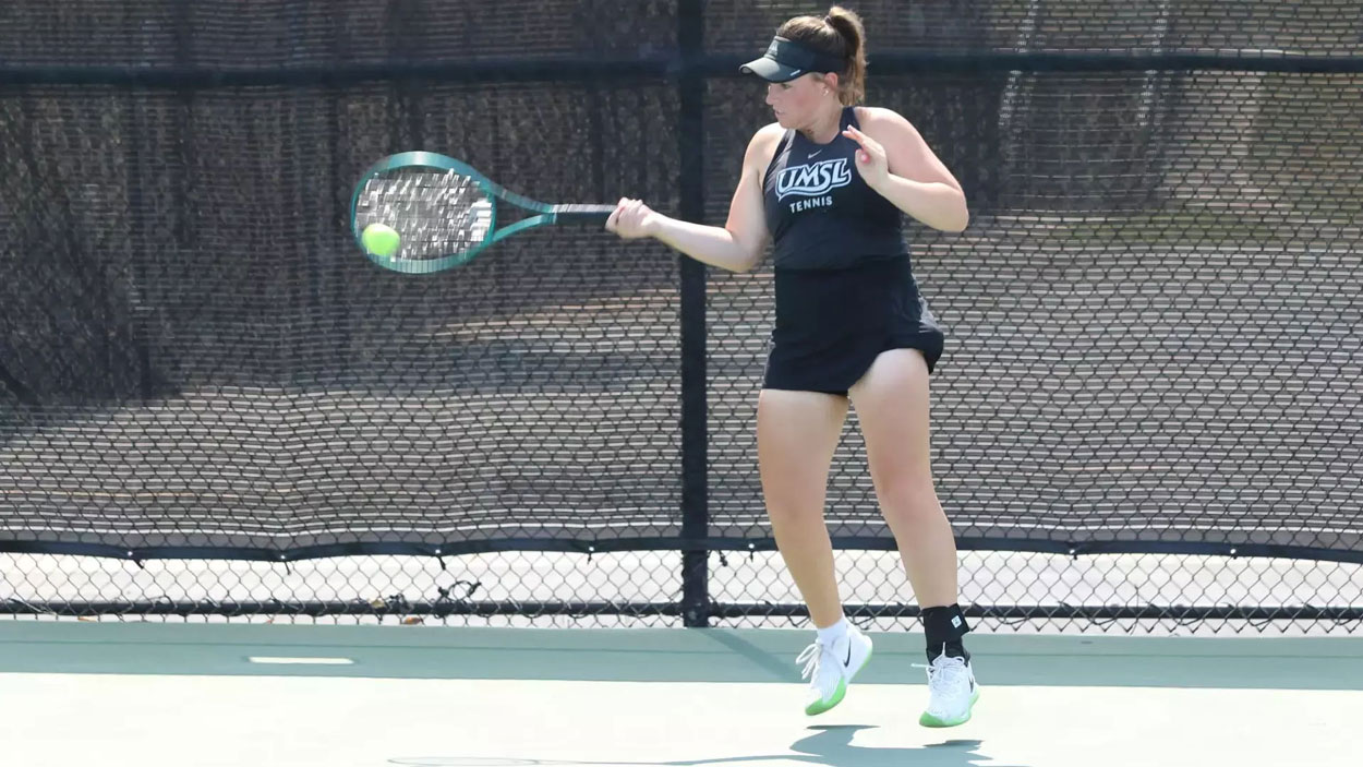 Tennis player Morgan Lint hits a forehand shot