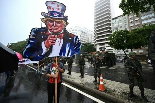 A cardboard cutout of Donald Trump as Uncle Sam at a march in support of the Palestinian people in Rio de Janeiro, Brazil ahead of the G20 Summit