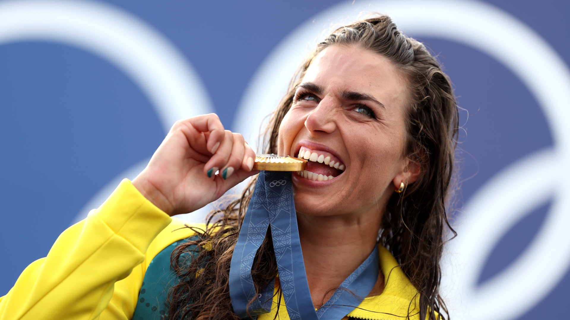 Why do Olympic winners bite medals?