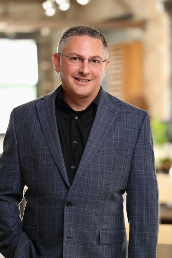 photographer,face,smile,outerwear,glasses,dress shirt