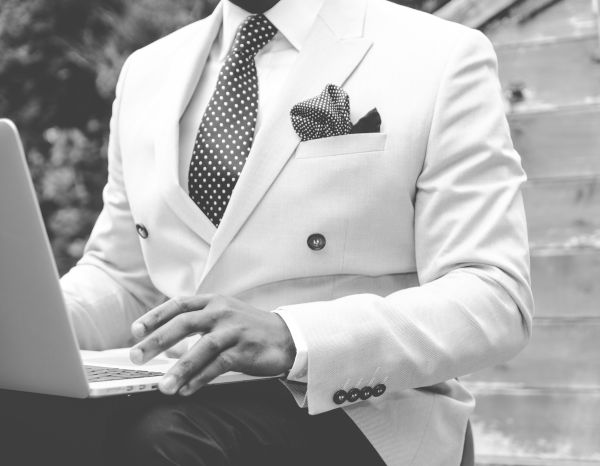 man,person,suit,people,work,black and white