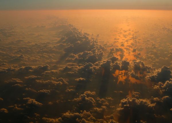 sea,horizon,cloud,sky,sun,coast