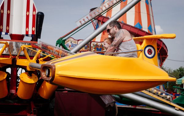 person,boat,vehicle,amusement park,aviation,park