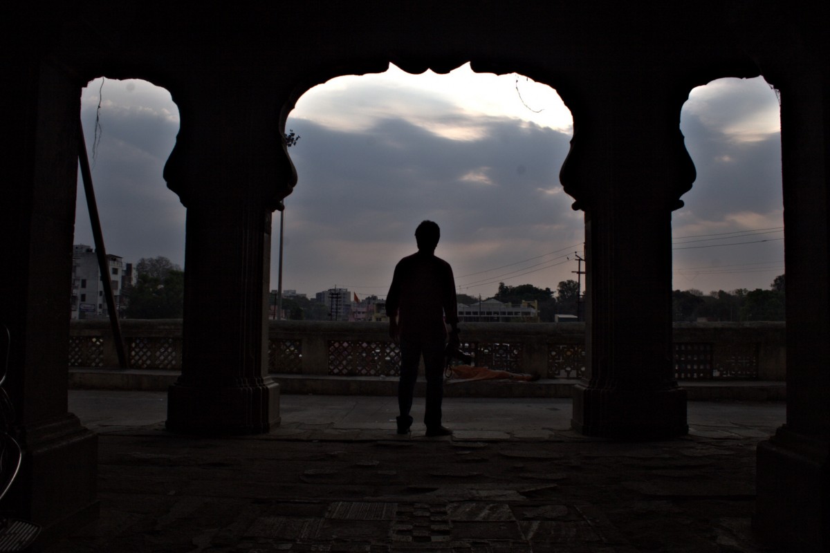 nature, silhouette, light, cloud, sky, sunset, night, sunlight, morning, monument, dusk, environment, arch, evening, reflection, column, tranquil, scenic, weather, shadow, darkness, cloudscape, outdoors, clouds, temple, riverside, screenshot, sillhouette, meteorology, sillhouette people