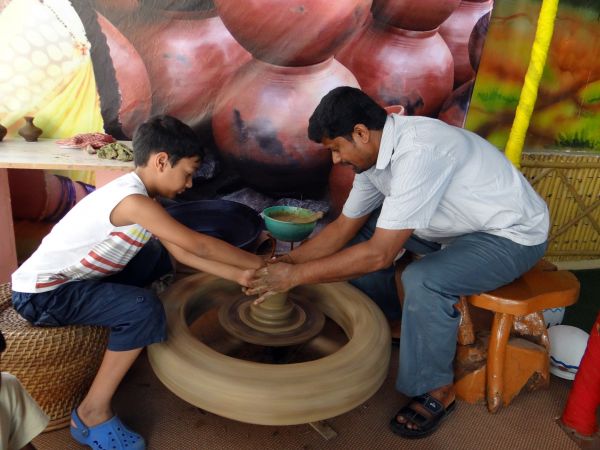 hand,people,wheel,play,pot,workshop