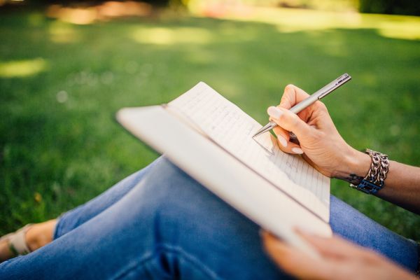 notebook,writing,book,hand,grass,people