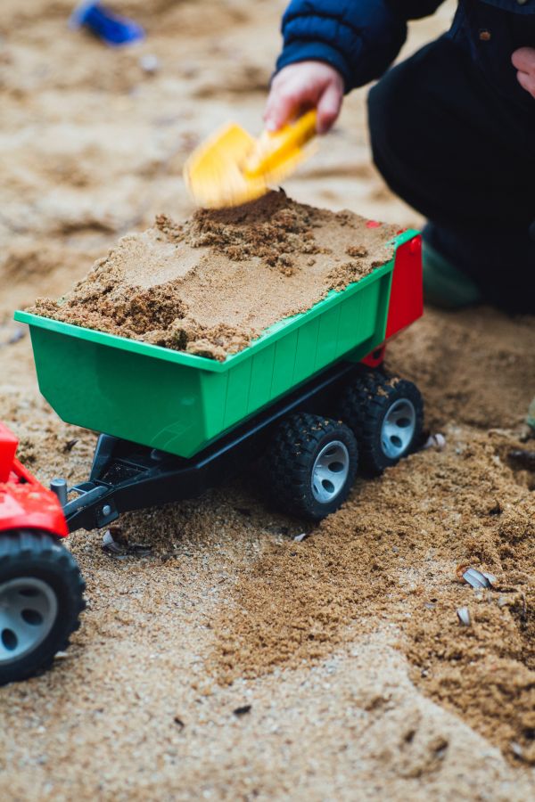 soil,vehicle,cart,sandpit,sand,toy