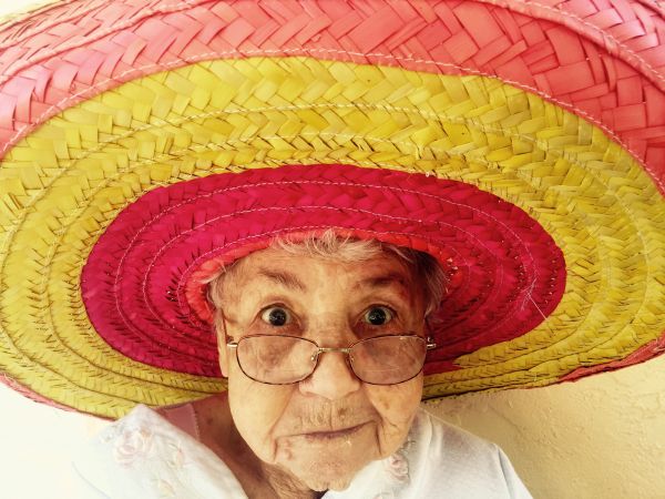 woman,hat,clothing,headgear,hairstyle,wrinkle