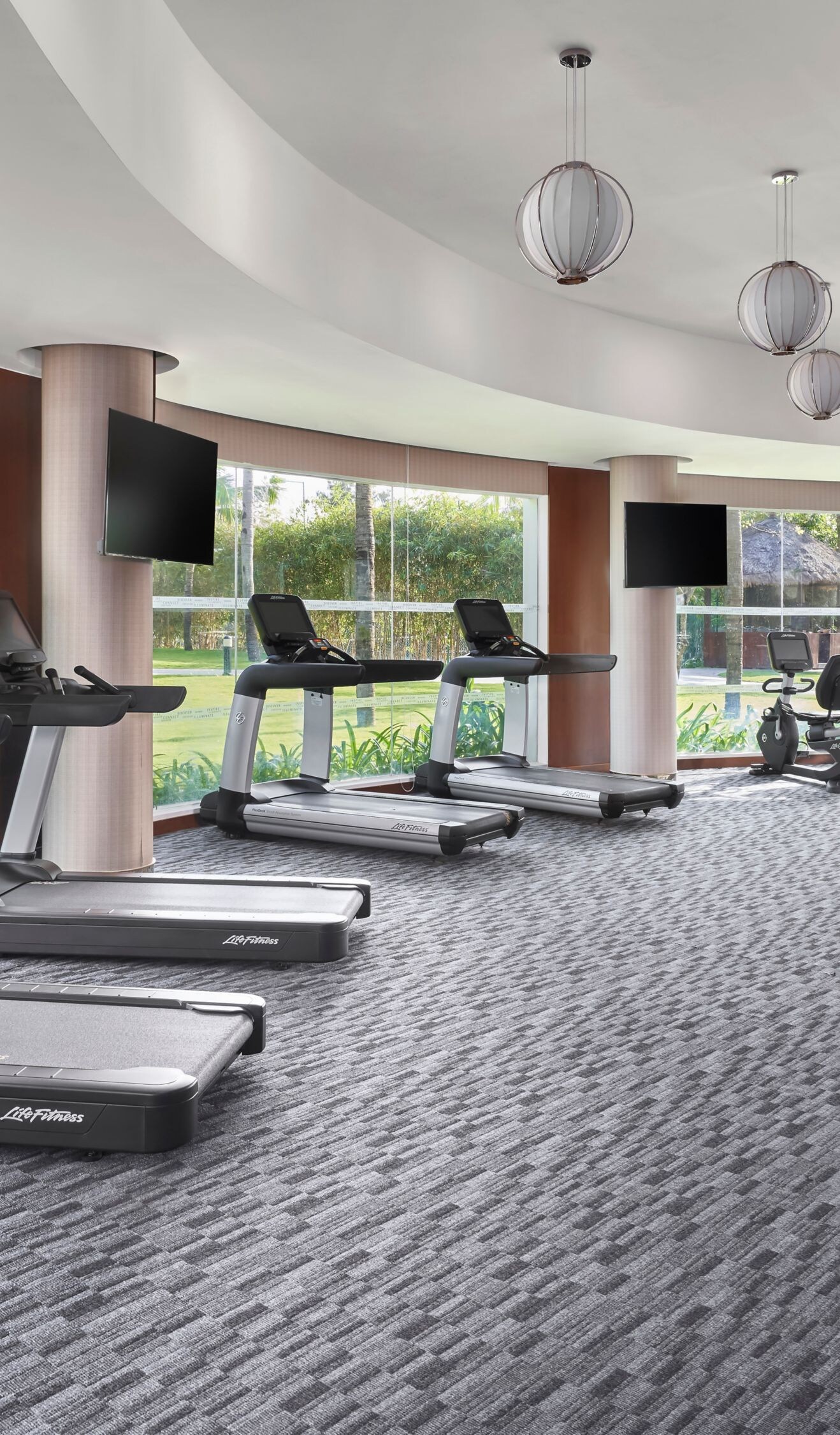 fitness center with cardio and strength equipment