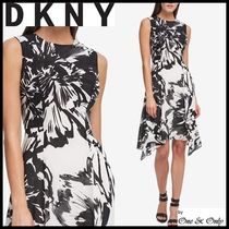 【新着/独占販売】DKNY 白x黒大花柄ハンカチ調裾ミディ夏ドレス