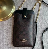 セールCoachシグネチャーフォーンスマホチェーンクロスボディ