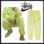 STUSSY スウェットパンツ 関税込★Stussy Nike x Stussy NRG RA Washed Fleece Pants Volt