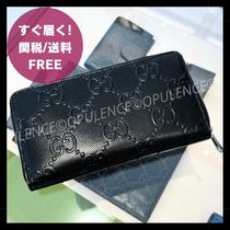 GUCCI グッチ GGエンボス レザー ジップ 長財布 パスポート 黒