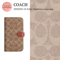 【COACH】IPHONE 15 フォリオ・シグネチャー キャンバス