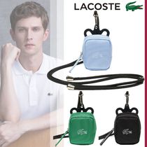 国内即発【LACOSTE】ソリッドナイロン ポーチ付スマホホルダー