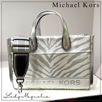 【Michael Kors】ゼブラジャカードのジジメッセンジャーバッグ