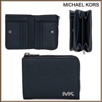 どの様なシーンにも Michael Kors RIVINGTON フォリオウォレット