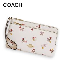 携帯収納も可能【Coach】ハートプリント ダブルジップウォレット