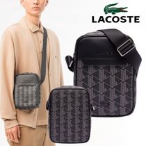 国内直営**LACOSTE**バーティカルショルダーバッグ