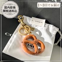 すぐ届く★【COACH】プレッツェル バッグチャーム ギフトにも◎