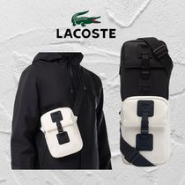 残りわずかLacoste NAOS バーティカルショルダーバッグ男女兼用