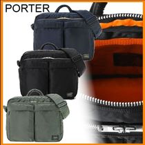 ビジネスにも PORTER TANKER  SLING BAG W zip XL