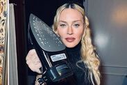 madonna-family-photos-doting-mom-ironing-drinking