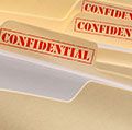 Manila folders marked confidential.