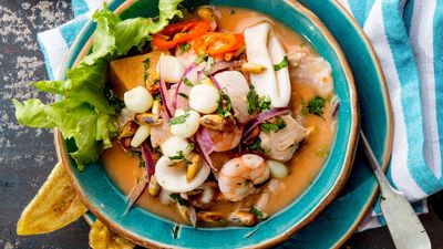 Ceviche. Peruvian ceviche (sebiche). Raw seafood dish with lime, cilantro, peppers, plantains. Cuisine, food