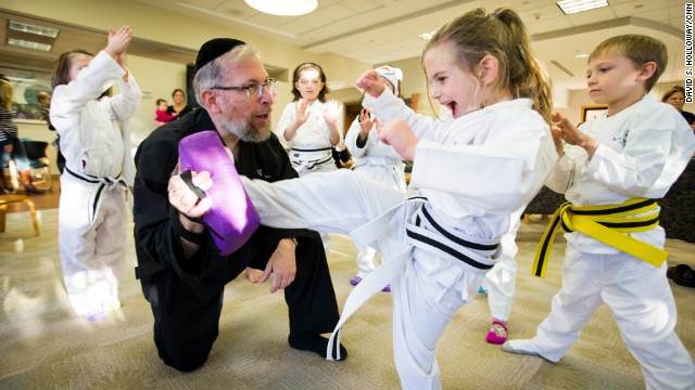 CNN Hero Rabbi Elimelech Goldberg teaches at the Kids Kicking Cancer Center in Detroit, Michigan on October 28.