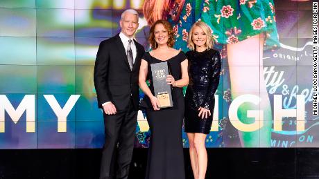 NEW YORK, NY - DECEMBER 17:  (L-R) Anderson Cooper, 2017 CNN Hero of the year Amy Wright, and Kelly Ripa pose onstage during CNN Heroes 2017 at the American Museum of Natural History on December 17, 2017 in New York City. 27437_017  (Photo by Michael Loccisano/Getty Images for CNN)