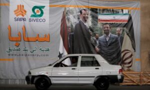 A man drives a car inside the Iranian Saipa factory in Syrian Homs - November 14, 2018 (Reuters)