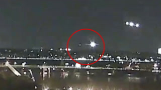 Video appears to show American Airlines and helicopter crash