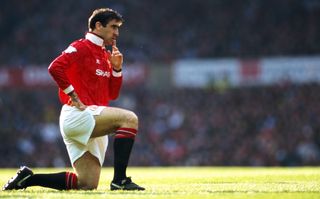 Manchester United's Eric Cantona gestures during a game against Manchester City in April 1993.