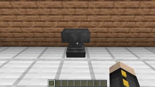 Minecraft anvil - an anvil on a floor made of iron blocks in Minecraft