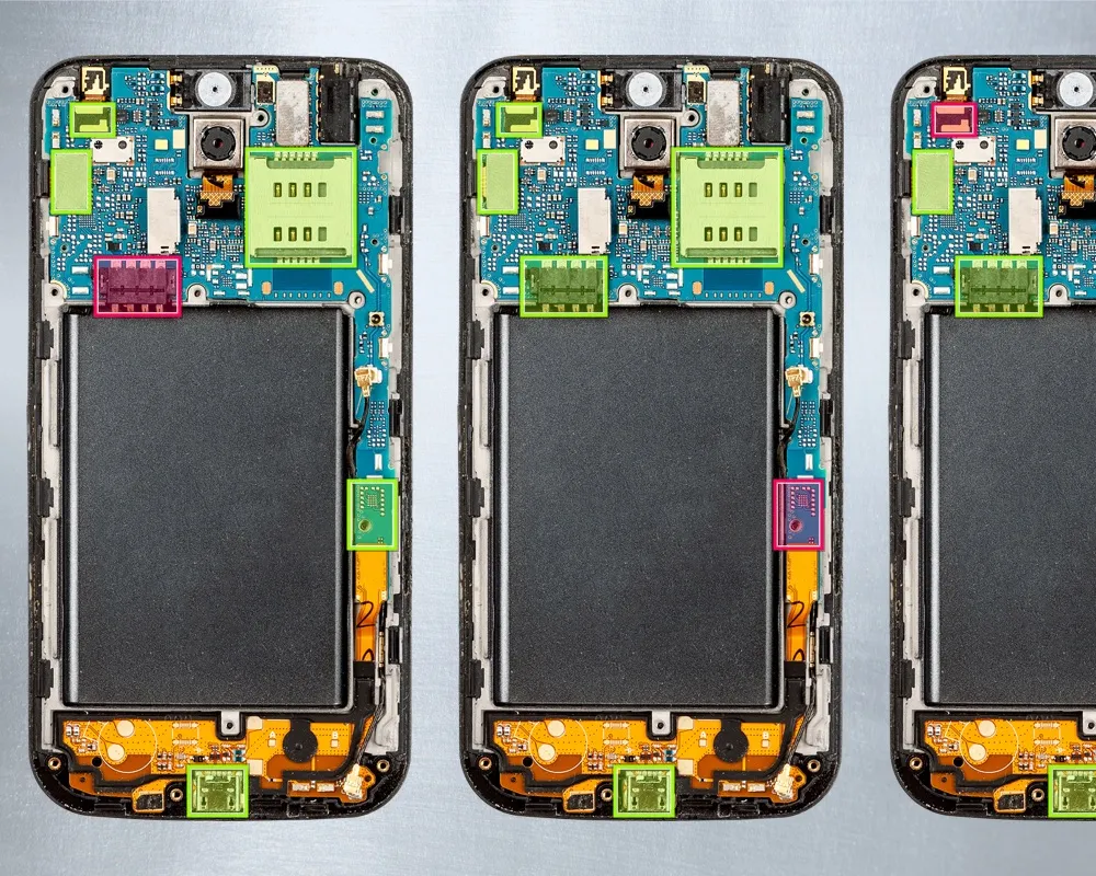 Interior of smartphone showing circuit board, with bounding boxes around components