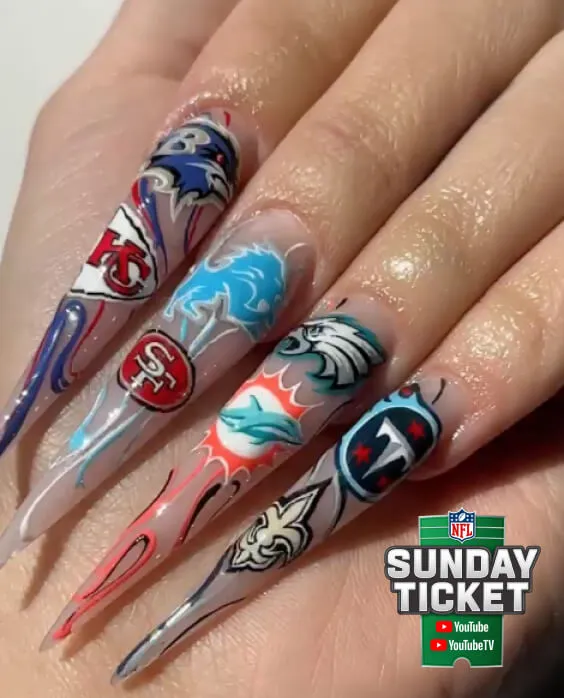 A woman's hand with a bunch of nail designs on it