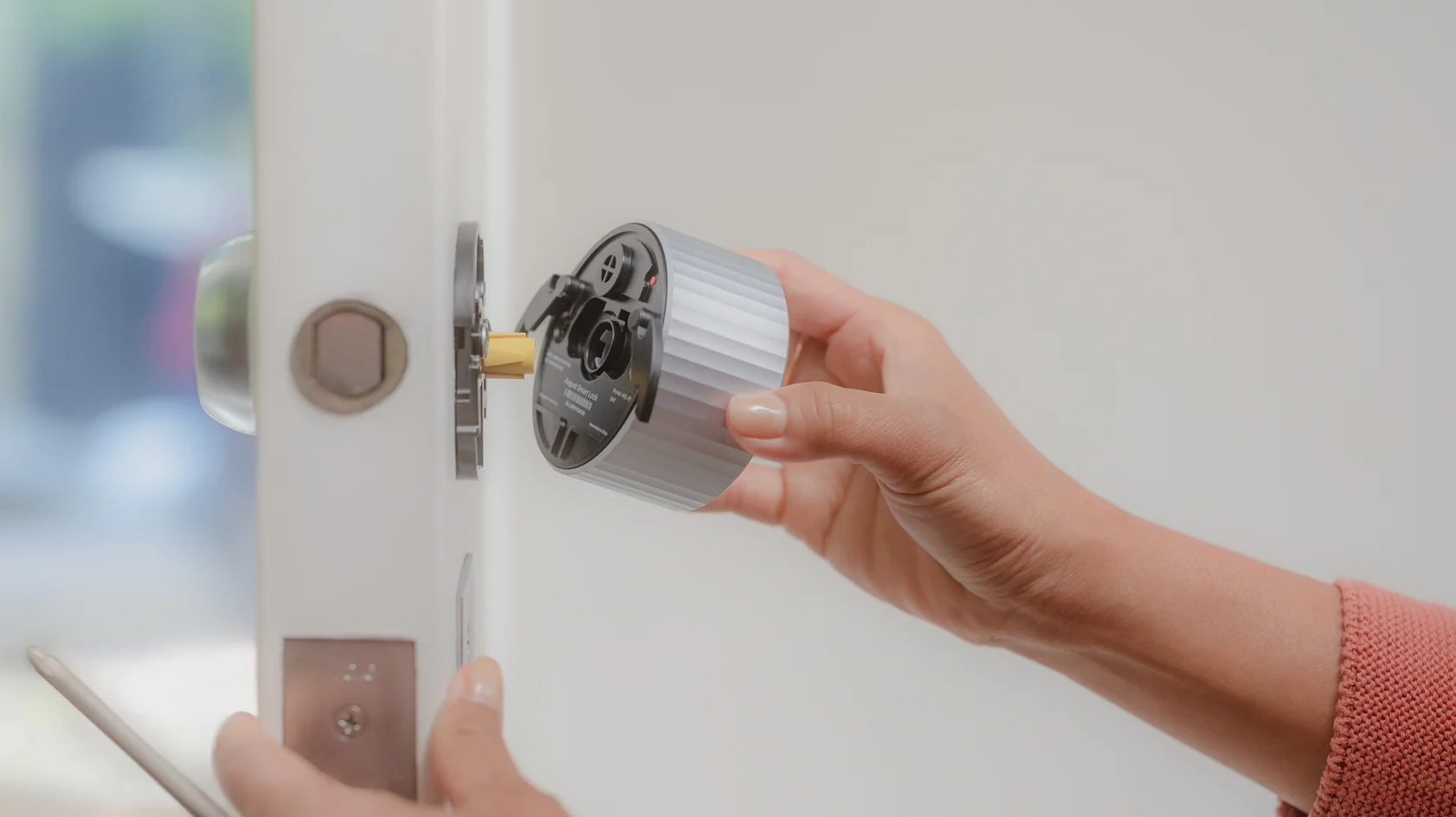 A smart door lock is fitted to a door.