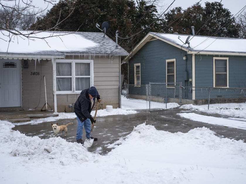 A man shoveling snow.