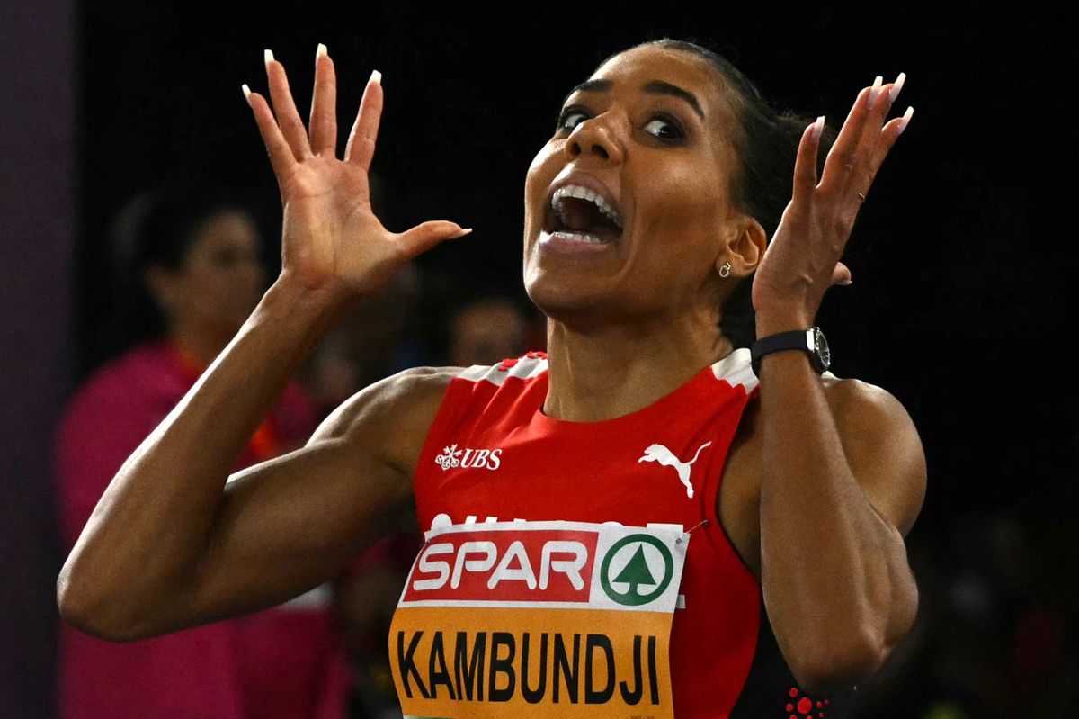 Switzerland's Mujinga Kambundji celebrates winning the women's 200m final during the European Athletics Championships at the Olympic stadium in Rome on June 11, 2024. (Photo by Andreas SOLARO / AFP)