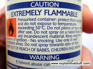 Caution extremely flammable: warning sign on the back of an aerosol can.