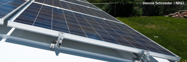 Photo of an amorphous silicon solar cell panel on a rooftop.