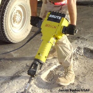 A yellow Bosch Brute electric jackhammer drill.