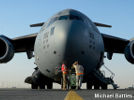 Front view of huge USAF C-17 globemaster plane waiting on a runway